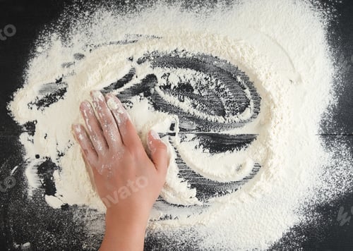 Preview: White Wheat Flour Scattered On A Black Background, Product Is Spread Over The Surface, Kitchen