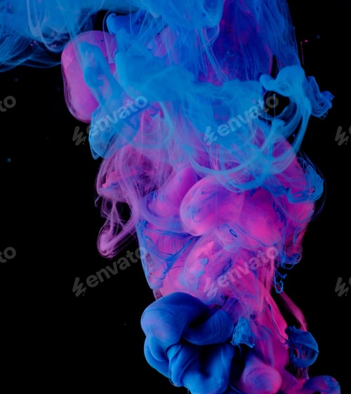 Preview: Blue Pink Clouds Of Ink In Liquid Isolated On Black