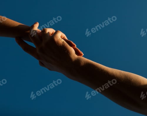 Preview: Image Of Two Hands Of Man And Woman On White Background. Silhouette Of Hand Shake With
