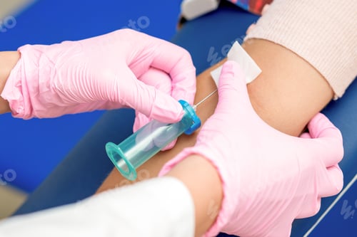 Preview: Nurse Takes Blood Sampling Introducing A Needle Into A Vein Of Woman'S Arm.