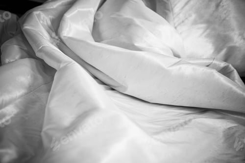 Preview: Detail Of A White Wedding Dress Hanging.