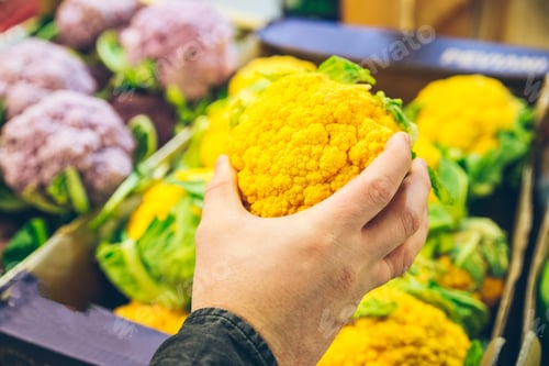 Preview: Shelf At The Market With Cauliflower In Boxes Mans Hand Take One