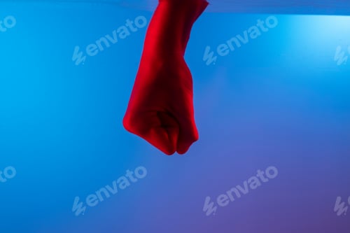 Preview: Strong Sign.Hand Pose In Red And Blue Light