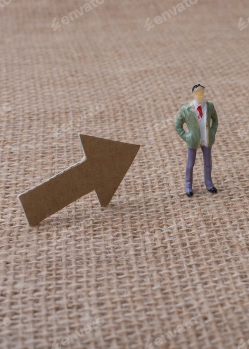 Preview: Colorful Letter Cubes And A Calculator Beside A Figurine