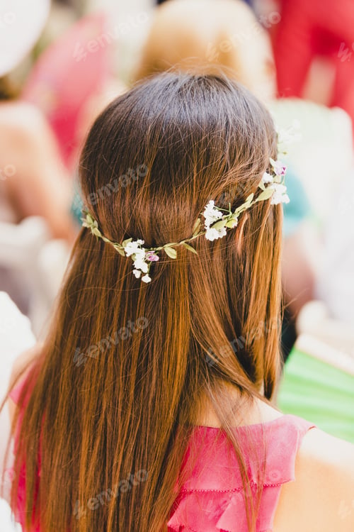 Preview: Woman With Straight Hair Combed With A Wreath Of Flowers In Spring Style.