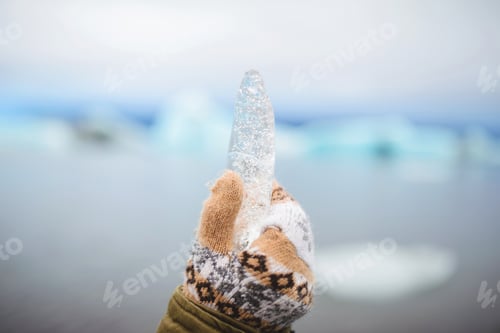 Preview: Closeup Of Ice Piece In Woman'S Hand
