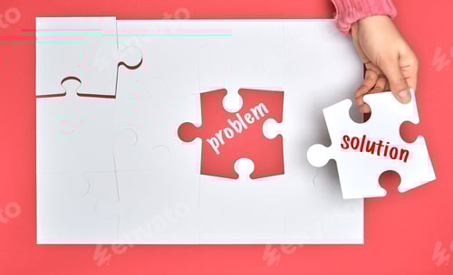 Preview: Female Hand Holding White Puzzle With The Word Solution, Process Of Closing The Missing Element