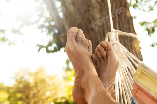 Preview: Feet Lying In Hammock Resting In Summer Outdoors
