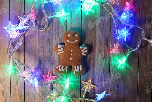 Preview: Gingerbread Man Closed Up On Christmas Lights Background