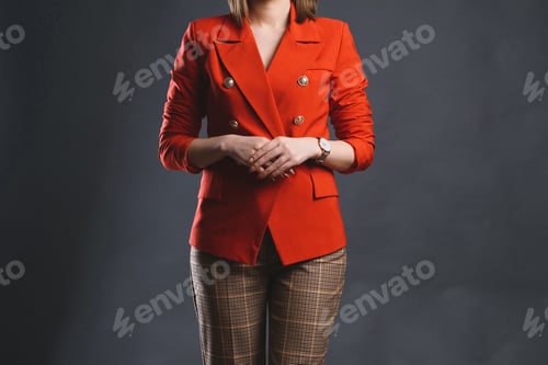 Preview: Woman In Red Jacket Standing At Studio