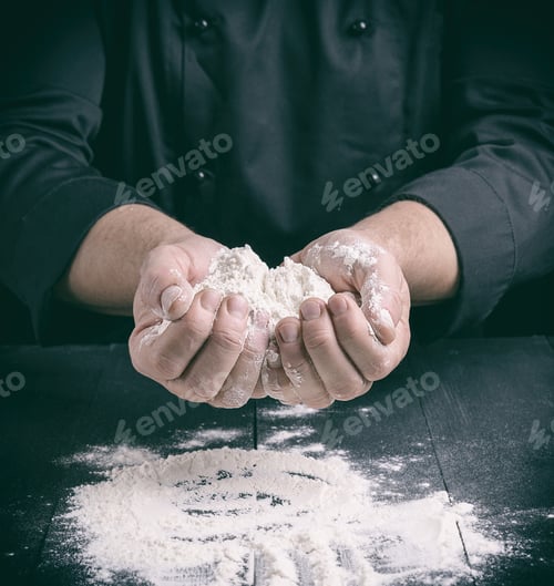 Preview: White Wheat Flour In Male Hands, Close Up