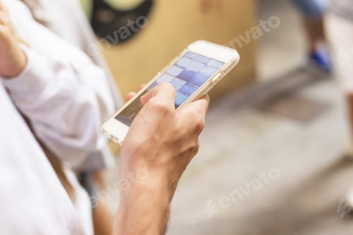 Preview: Hands With The Mobile Phone On The Street