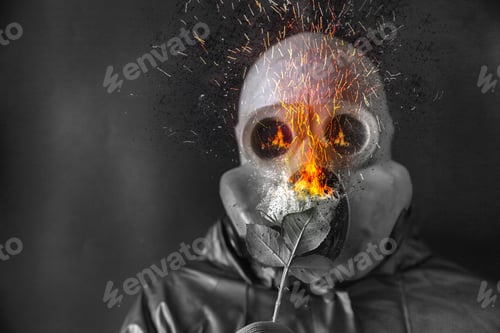 Preview: Man In The Gas Mask Holding A Burning Flower. Radiation Influence. Environmental Pollution