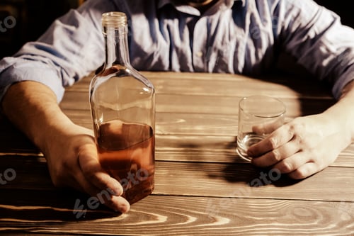 Preview: Alcoholic Addict. Man Holding With Alcohol And A Glass. Economy Crisis, Poverty, Unemployment