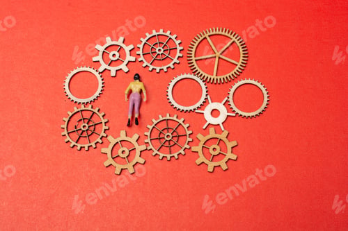Preview: Little Tiny Woman Person Figurine And Gear Wheels As Industry Concept