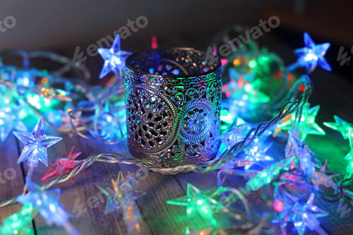 Preview: Star-Shaped Christmas Light Led Lamps With Ornate Metal Candlestick At The Background