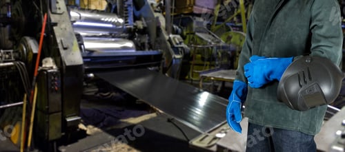 Preview: Worker With Instruments At Industrial Factory