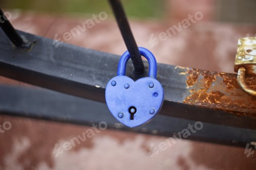 Preview: Heart-Shaped Blue Wedding Padlock On A Bridge Close Up