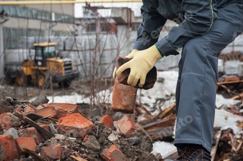 Preview: Worker Takes Down Blockages Of Broken Bricks