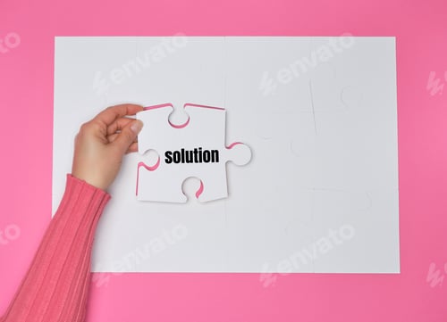 Preview: Female Hand Holding White Puzzle With The Word Solution, Process Of Closing The Missing Element