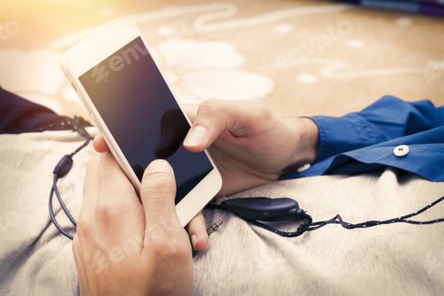 Preview: Hands With Mobile Phone At Home