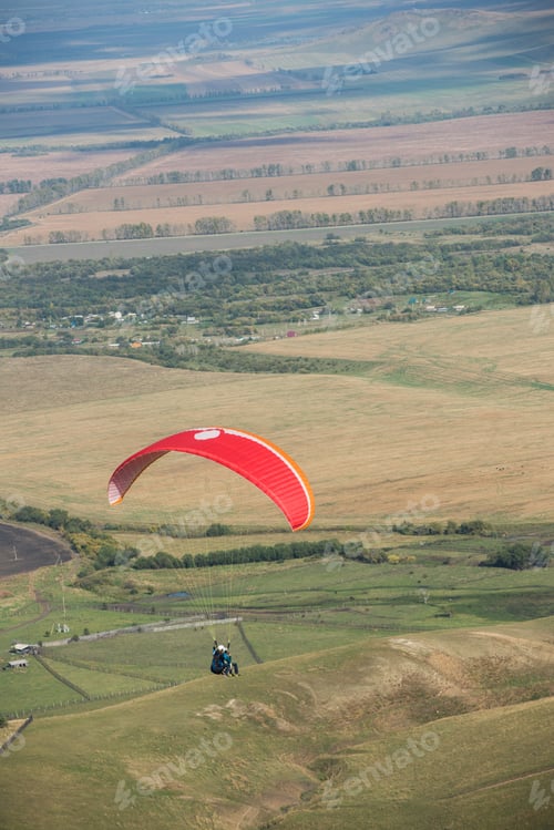 Preview: Paragliding In Mountains. Para Gliders In Fight In The Mountains, Extreme Sport Activity.
