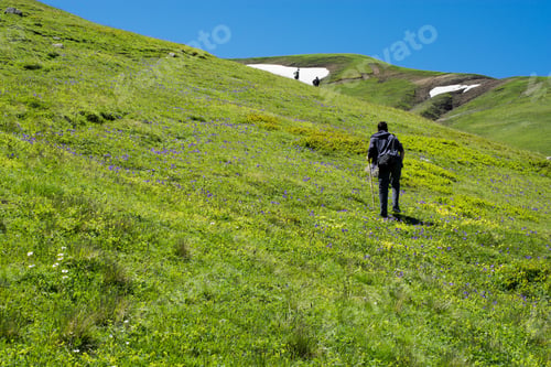 Preview: Young Man Taking An Excursion On A Mountain