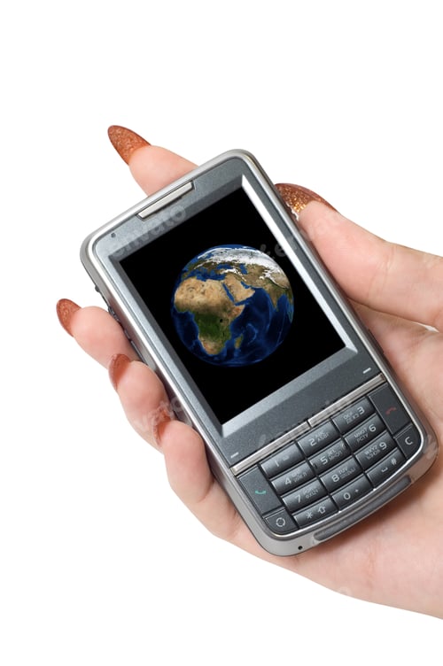 Preview: Female Hand Hold Communicator With Planet Earth At Screen.