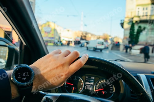 Preview: Man Driving Car In City Traffic Looking On Watch. First Person View. Late For Meeting