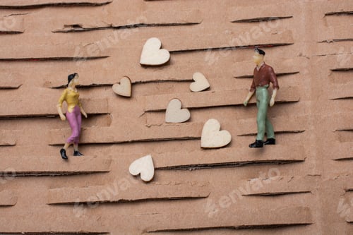 Preview: Tiny Figurine Of Man And Woman Miniature Model And Heart As Love Concept