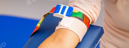 Preview: Medical Tourniquet On The Hand Of Female Patient In The Hospital
