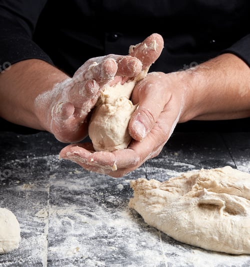 Preview: Cook Making Dough Balls On A Black Wooden Table, Close Up