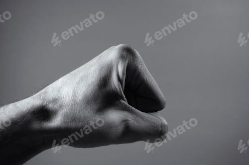 Preview: Male Clenched Fist. Left Hand In Black And White
