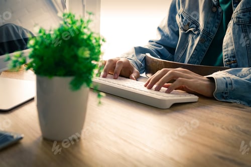Preview: Young Or Student Typing In The Computer