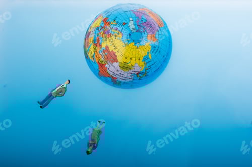 Preview: Little Globe With Floating Figurines Around In Water