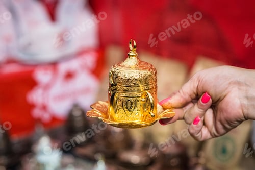 Preview: Hand Holding Turkish Coffee Cup