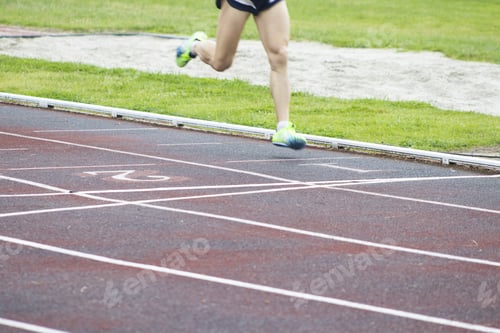 Preview: Athletes Running On The Athletics Track