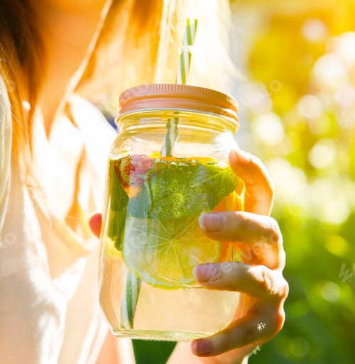 Preview: Girl Drinking Fresh Lemonade In Jars With Straws. Hipster Summer Drinks. Eco-Friendly In The