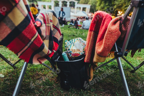 Preview: Two Folding Chairs With Cooling Bag With Beer And Snacks In Open Air Cinema Copy Space