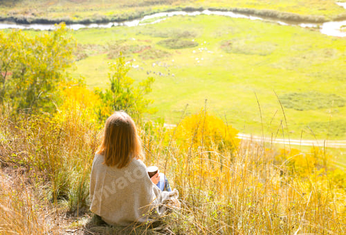 Preview: Beautiful Girl Drinking Coffee In Autumn Nature. A Cup With Hot Drink In The Mountains. Cosy Mood