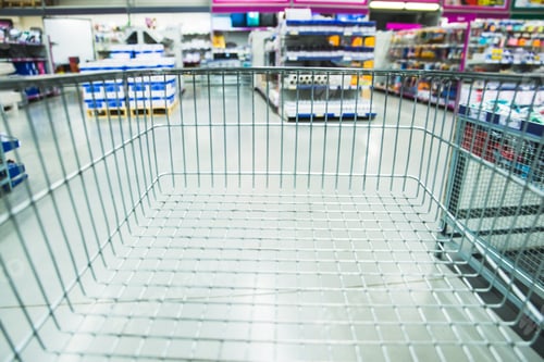 Preview: Cart With Blurred Woman On Background In Shopping Mall