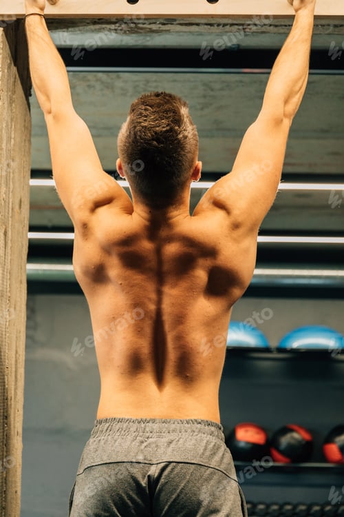 Preview: Athletic Male On A Climbing Wall, Indoor Sports. Handsome Man With Fit And Muscular Body. Workout