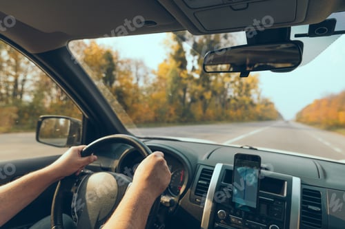 Preview: Road Trip Concept Man Hands On Steering Wheel Navigation On The Phone