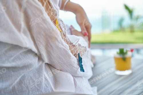 Preview: Woman Resting By The Pool