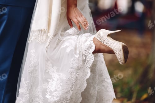 Preview: Beautiful Bride At Countryside Wears Heeled Shoes