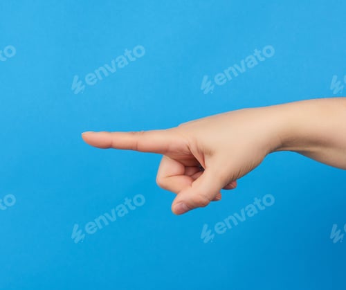 Preview: Female Hand Holds Pointing With Index Finger, Part Of The Body On A Blue Background