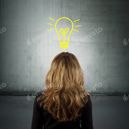 Woman with Light Bulb Over Head Facing Wall