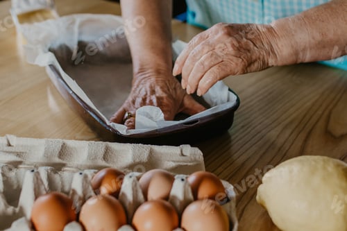 Preview: Woman In The Kitchen Making Christmas Desserts Or Pastries