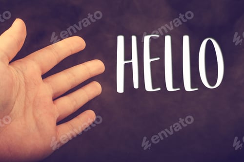 Preview: Hand Making A Hello Welcome Gesture On Dark Background