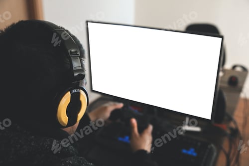 Preview: Gamer In The Headphones Near White Screen. Video Game Addiction. Guy In Hoodie Near The Computer